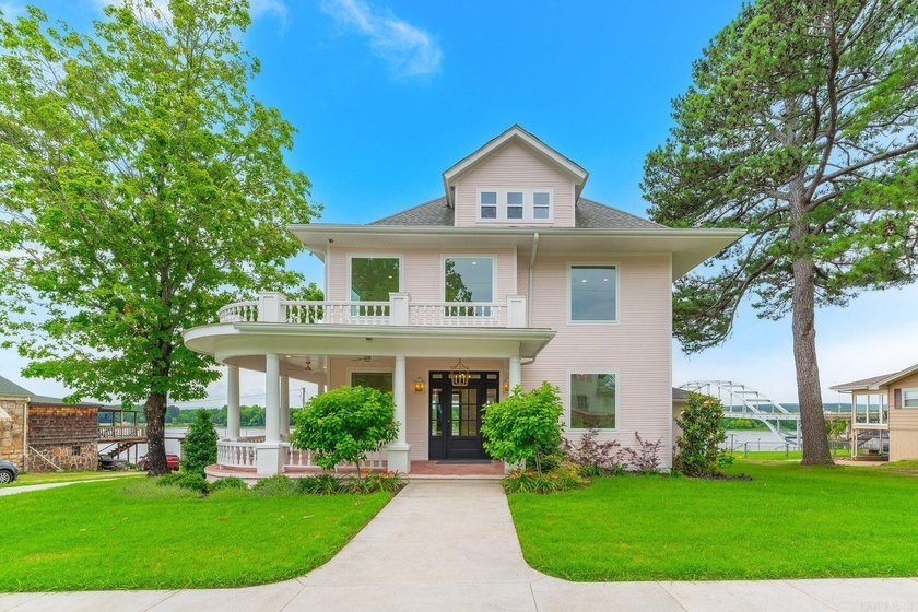 Perched high above the Arkansas River in Ozark, this beautifully - photo 31