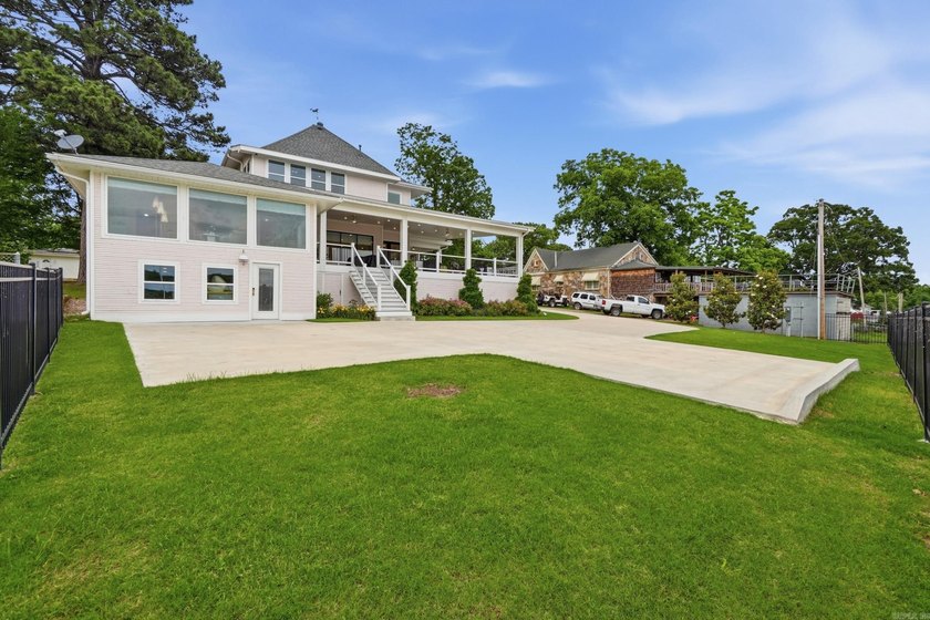 Perched high above the Arkansas River in Ozark, this beautifully - photo 39
