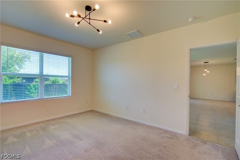 Welcome to this beautifully maintained 4-bedroom, 2-bath home in - photo 11