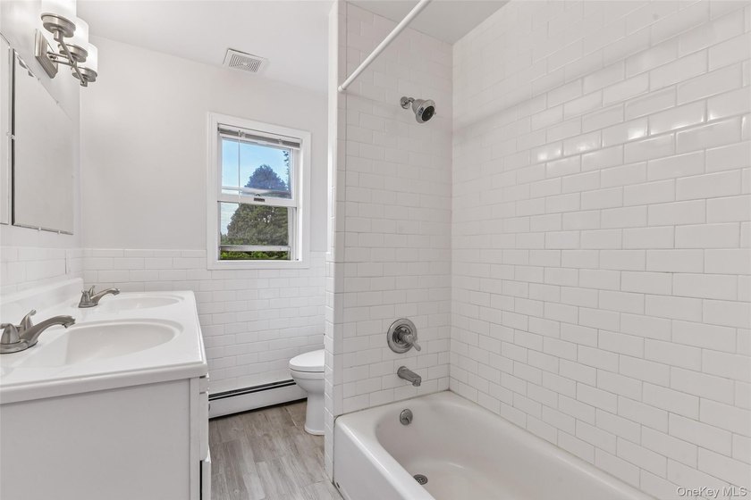 Rare Opportunity! Exceptional Two-Family Home in Manhasset A - photo 27