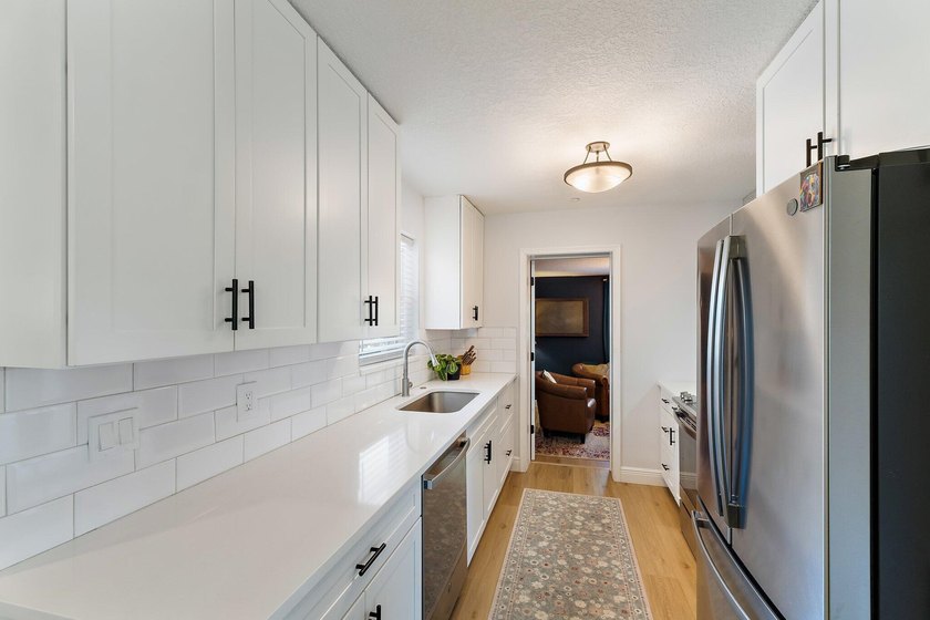 Positioned on an oversized corner lot in Lake Clarke Shores - photo 11