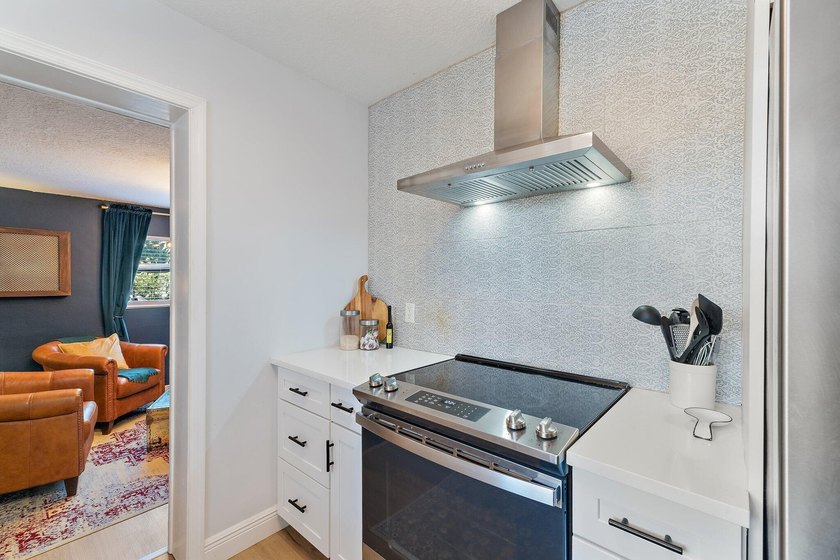 Positioned on an oversized corner lot in Lake Clarke Shores - photo 12