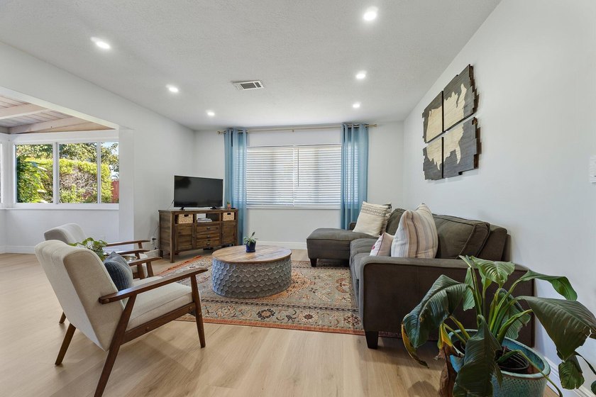 Positioned on an oversized corner lot in Lake Clarke Shores - photo 16