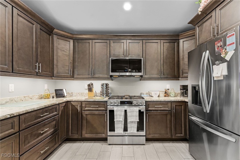 Come see this Beautifully designed heated pool home with an - photo 9