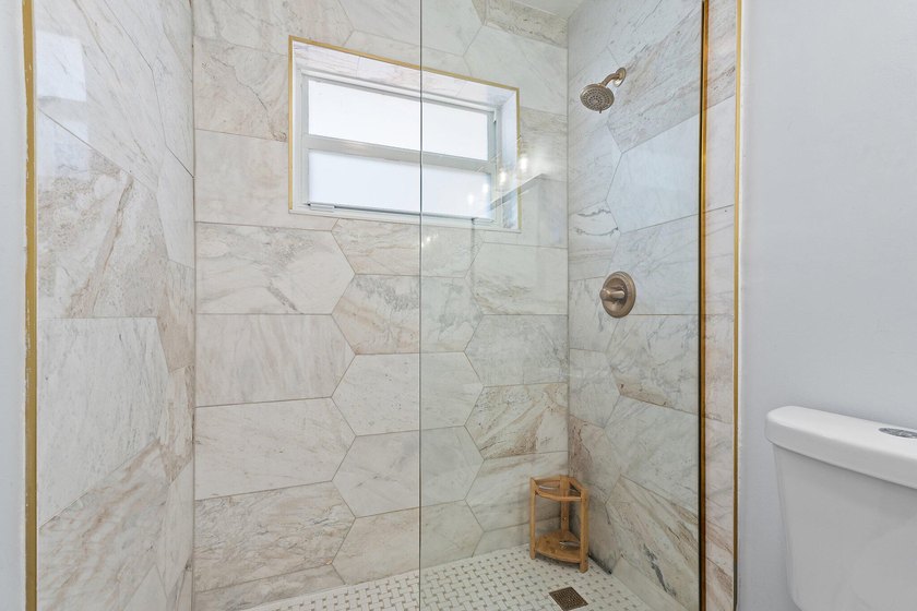 Positioned on an oversized corner lot in Lake Clarke Shores - photo 22
