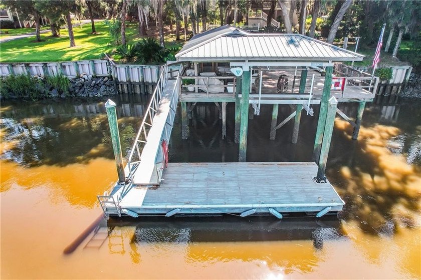 Private Deep Water Dock with Lift and Screened area. Nestled - photo 47