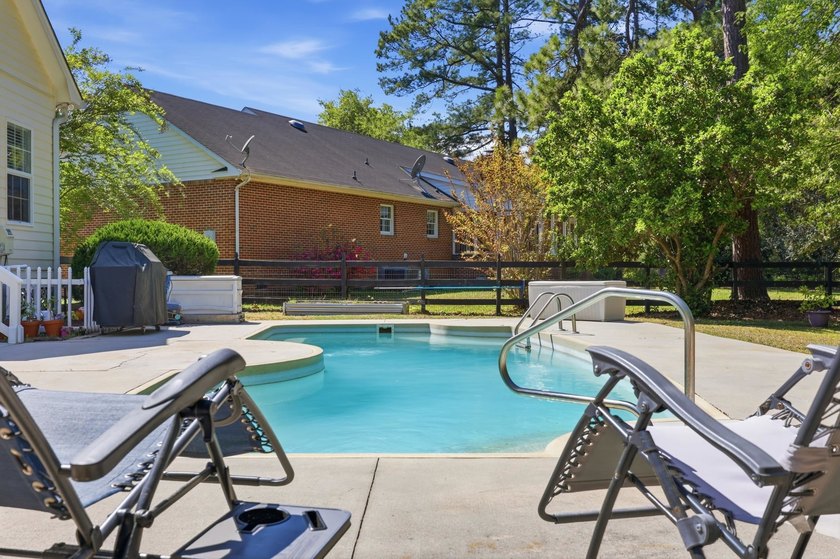 Saltwater pool, golf-course frontage, and oak hardwoods - photo 3