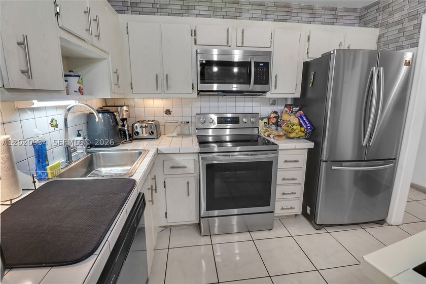 Beautifully maintained 2-bedroom condo located in the highly - photo 14
