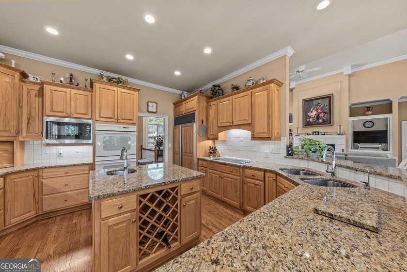 Nestled on 1.50 beautifully landscaped acres in the sought-after - photo 17
