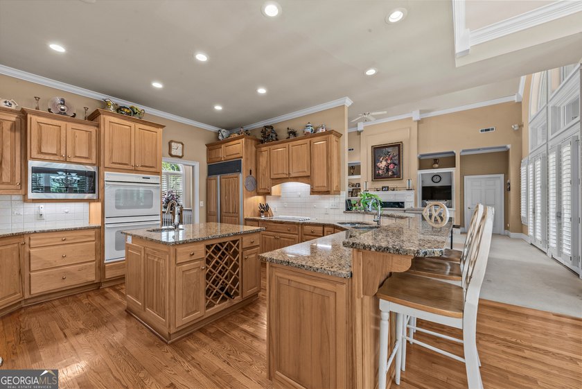 Nestled on 1.50 beautifully landscaped acres in the sought-after - photo 18