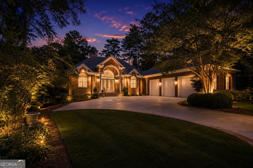 Nestled on 1.50 beautifully landscaped acres in the sought-after - photo 20