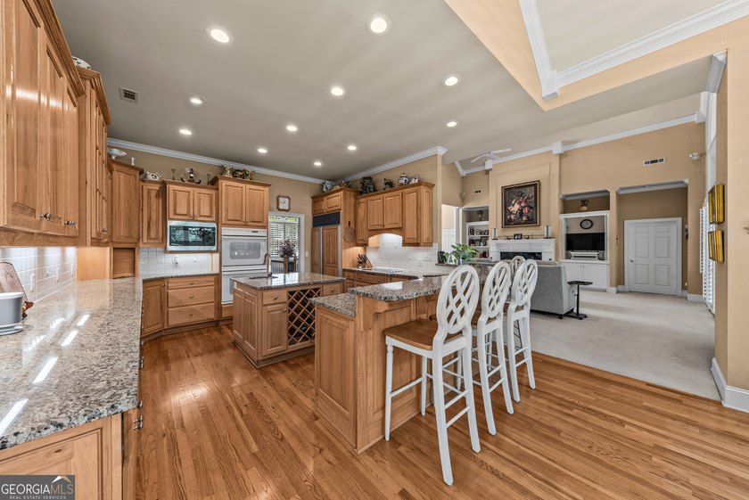 Nestled on 1.50 beautifully landscaped acres in the sought-after - photo 25