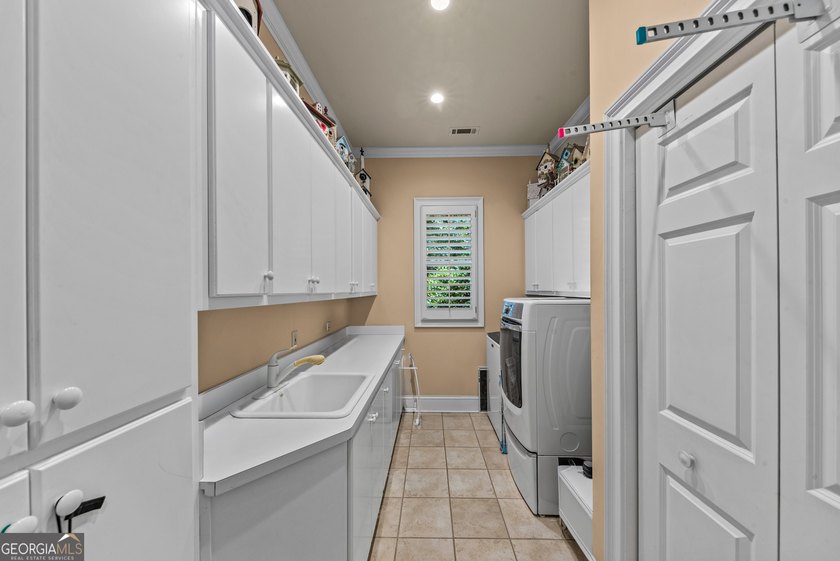 Nestled on 1.50 beautifully landscaped acres in the sought-after - photo 30