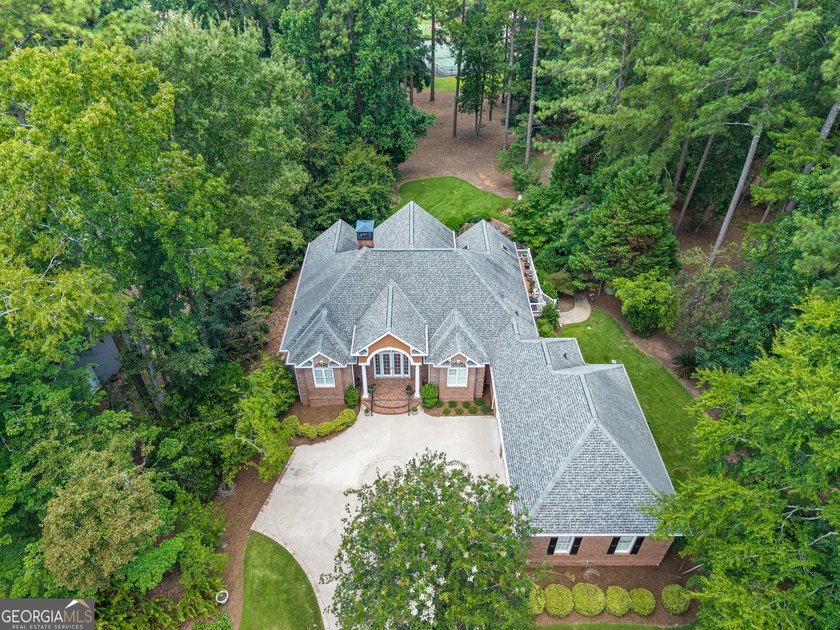 Nestled on 1.50 beautifully landscaped acres in the sought-after - photo 43