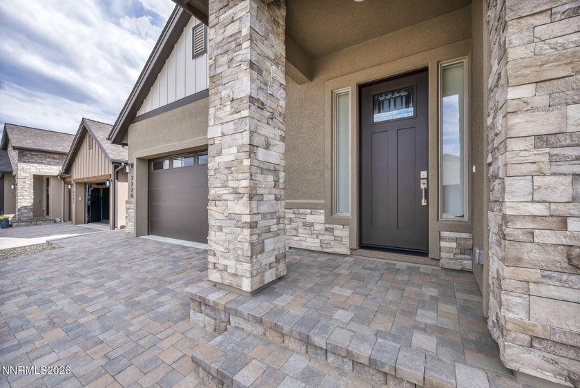 Experience luxury living at its finest in this better-than-new - photo 3