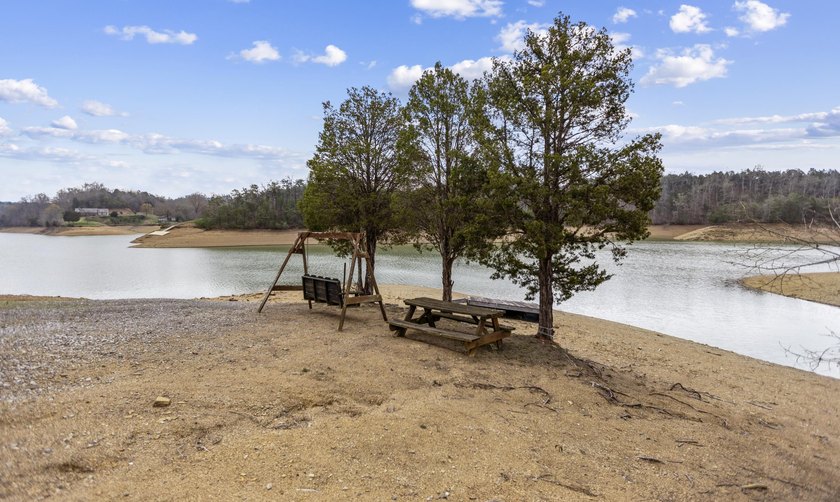 2.4 acres of lakefront property with open views and private - photo 16