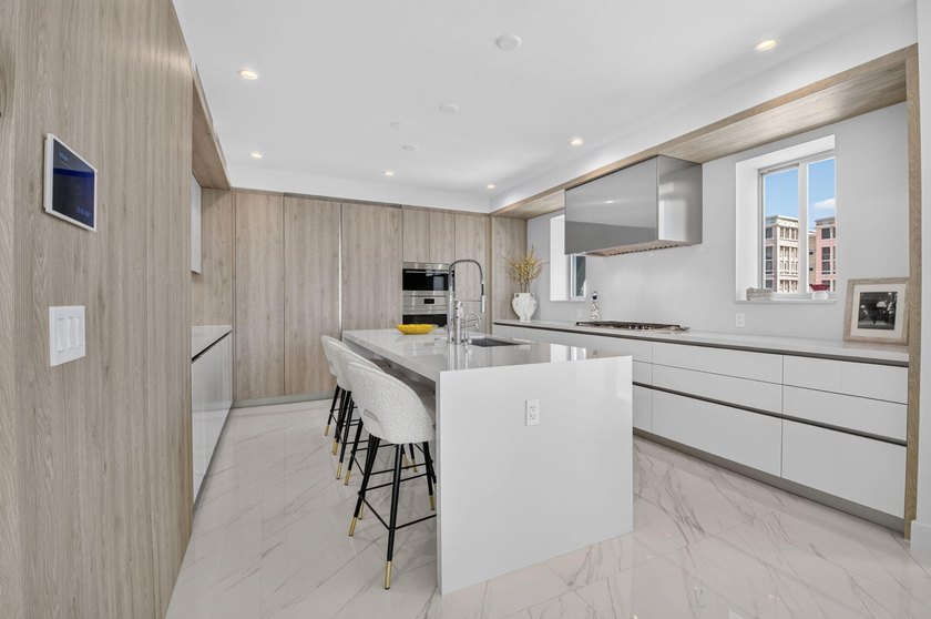 Discover Residence 601 - a rare corner residence in Royal Palm's - photo 12