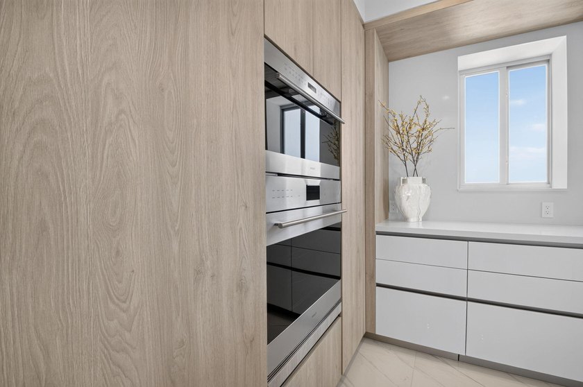 Discover Residence 601 - a rare corner residence in Royal Palm's - photo 18