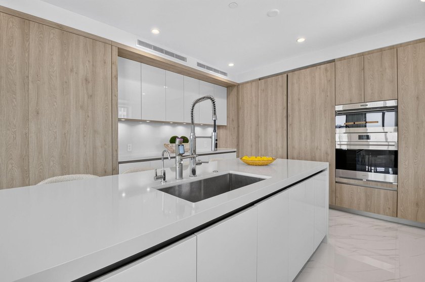 Discover Residence 601 - a rare corner residence in Royal Palm's - photo 20