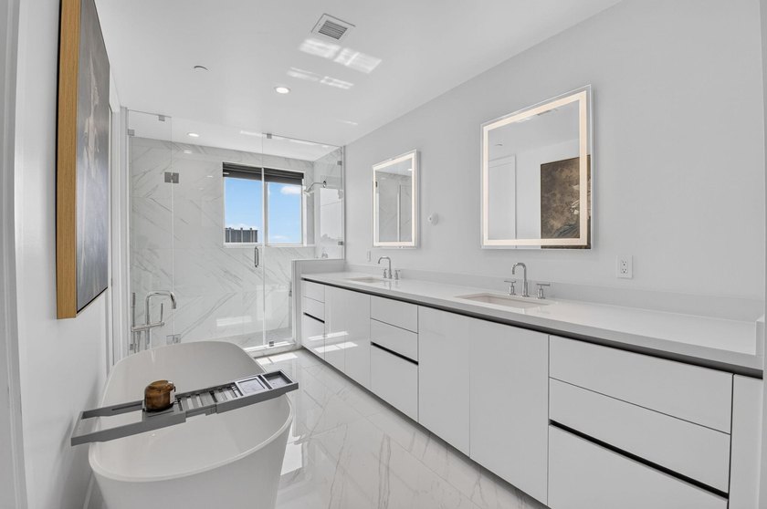 Discover Residence 601 - a rare corner residence in Royal Palm's - photo 24
