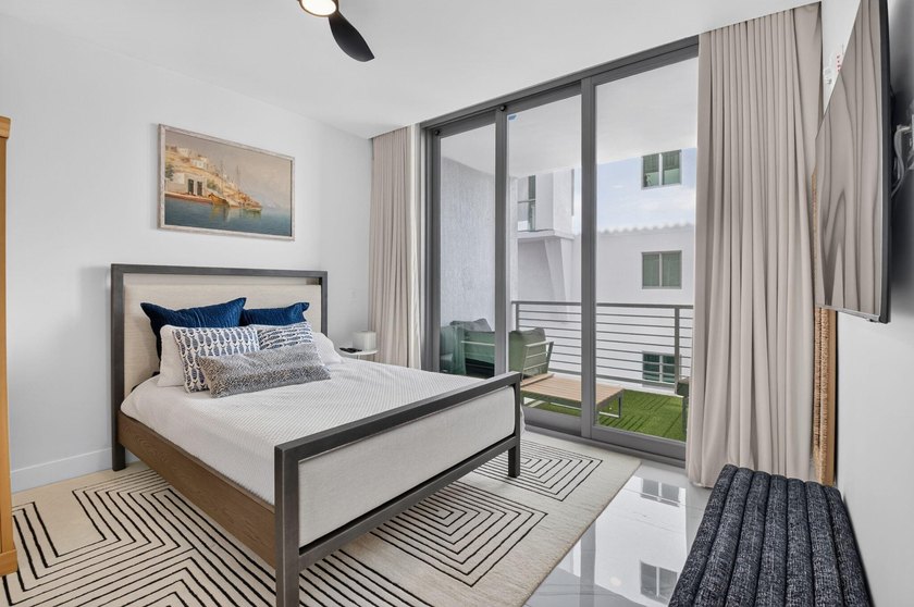 Discover Residence 601 - a rare corner residence in Royal Palm's - photo 27