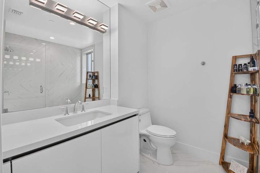 Discover Residence 601 - a rare corner residence in Royal Palm's - photo 28