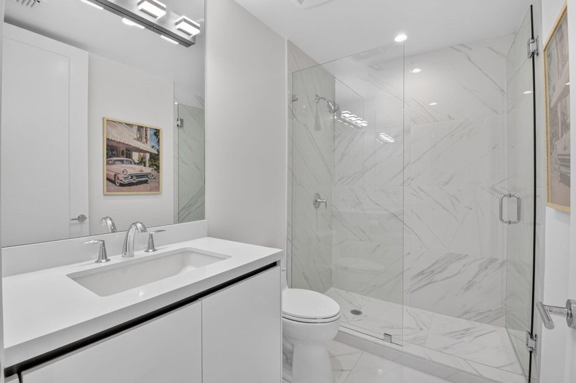 Discover Residence 601 - a rare corner residence in Royal Palm's - photo 32