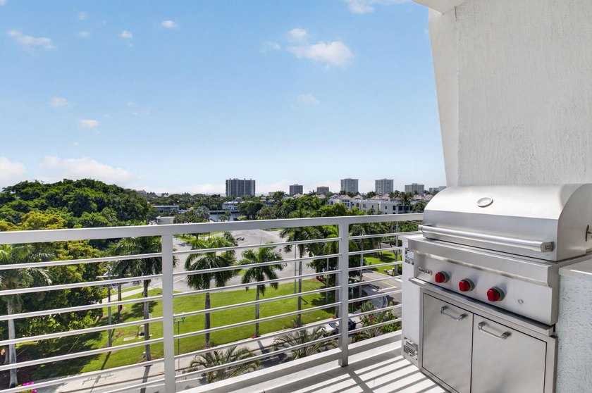 Discover Residence 601 - a rare corner residence in Royal Palm's - photo 37
