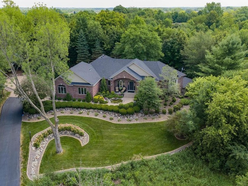 Nestled among mature trees on 2.97 acres in Corcoran's Windmill - photo 2