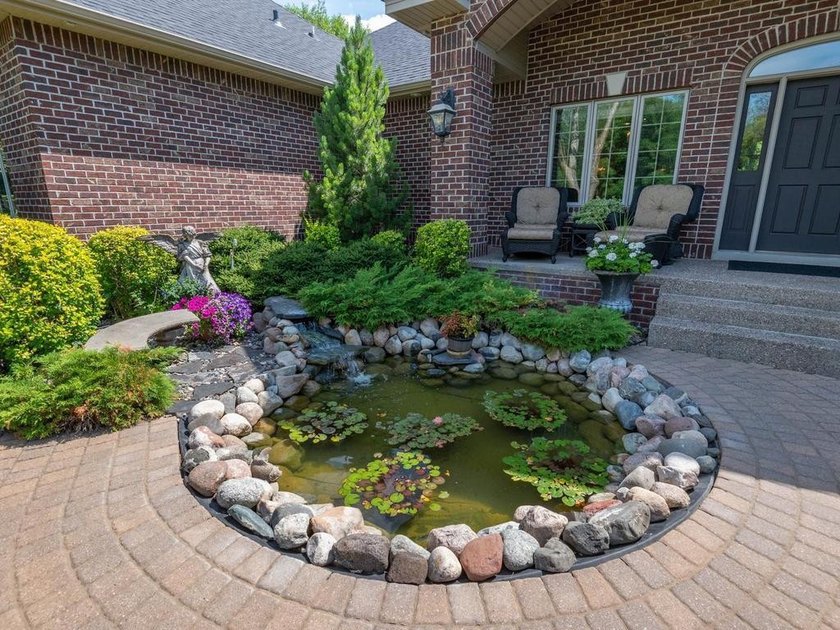 Nestled among mature trees on 2.97 acres in Corcoran's Windmill - photo 8