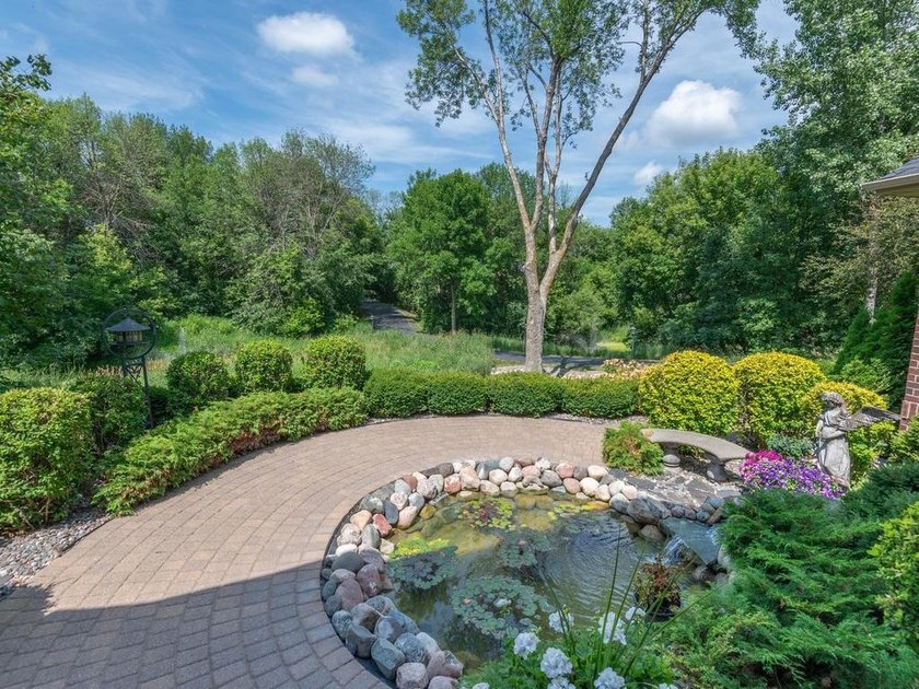 Nestled among mature trees on 2.97 acres in Corcoran's Windmill - photo 9