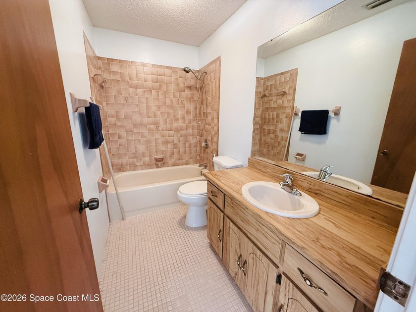 Discover the perfect blend of space and potential in this 3-bed - photo 24