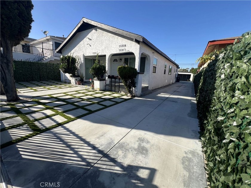 Welcome to 1131 E. 21st St, a rare and versatile - photo 2
