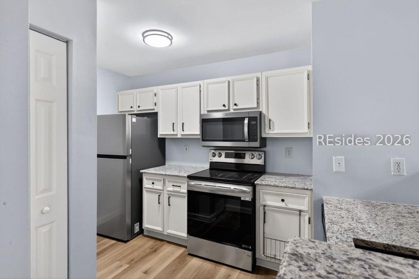 Beautifully updated 2-bedroom, 2-bath first-floor condo in the - photo 10