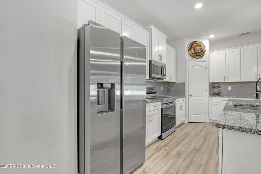Welcome to this beautifully maintained 2022-built home, ideally - photo 14