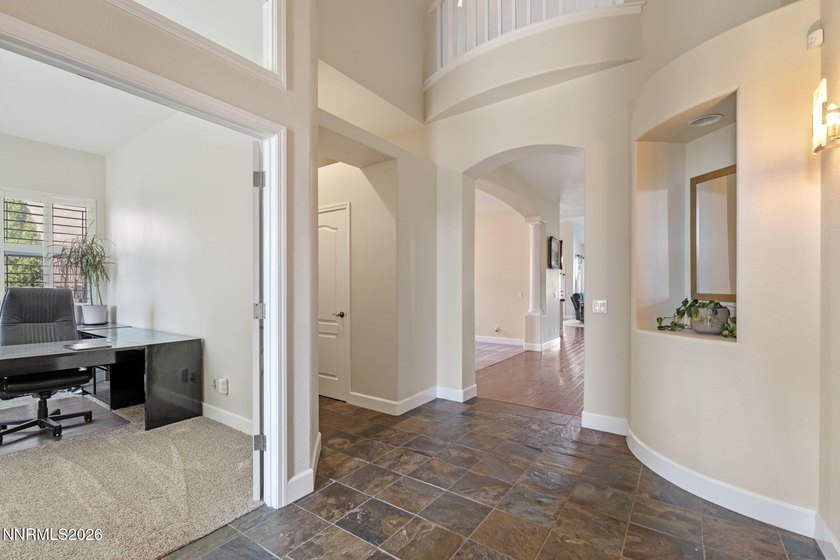 Welcome to 3312 Dog Leg Drive, an exceptional residence in the - photo 3