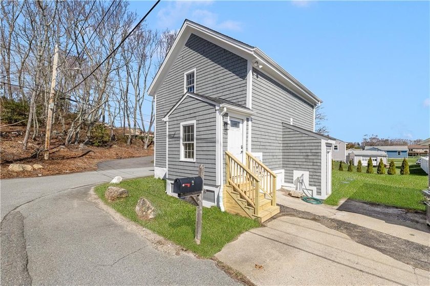 Welcome to your dream home at 2 Birch Street, a charming and - photo 2