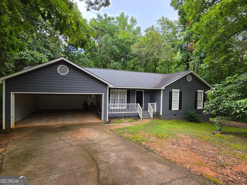 Welcome home to this charming one-level, three-bedroom, two-bath - photo 2