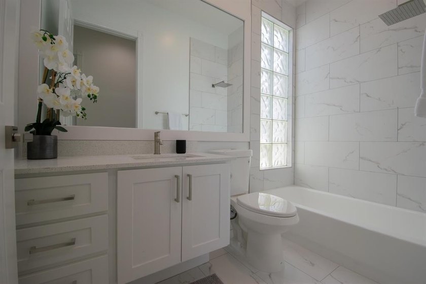 Discover waterfront living at 7046 Fish Creek Lane, a stunning - photo 15