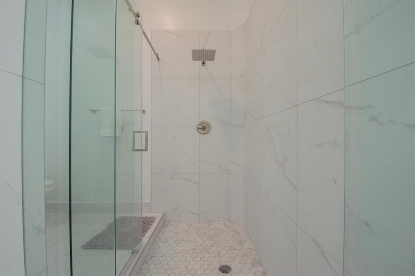 Discover waterfront living at 7046 Fish Creek Lane, a stunning - photo 22