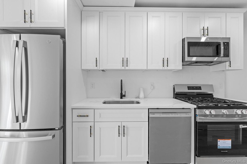 Experience modern living at its finest in this newly renovated - photo 3