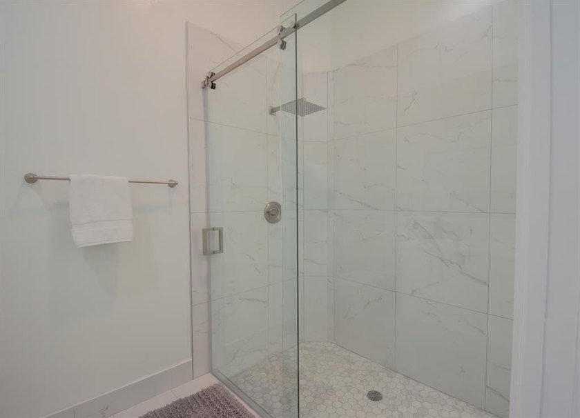 Discover waterfront living at 7046 Fish Creek Lane, a stunning - photo 23