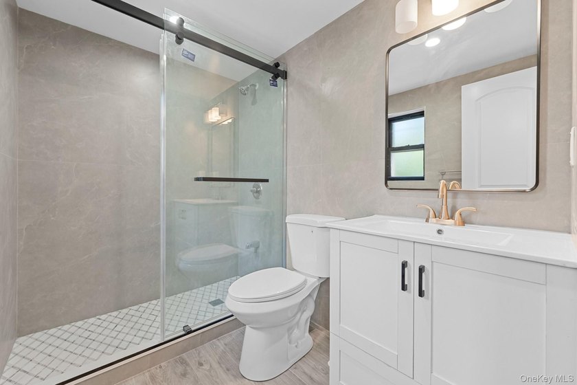 Experience modern living at its finest in this newly renovated - photo 4