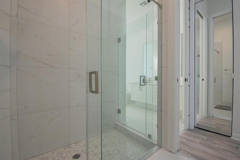 Discover waterfront living at 7046 Fish Creek Lane, a stunning - photo 24