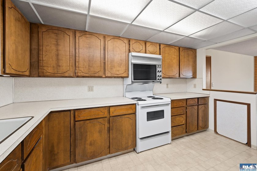 Enjoy easy living in this beautifully situated end-unit condo in - photo 11