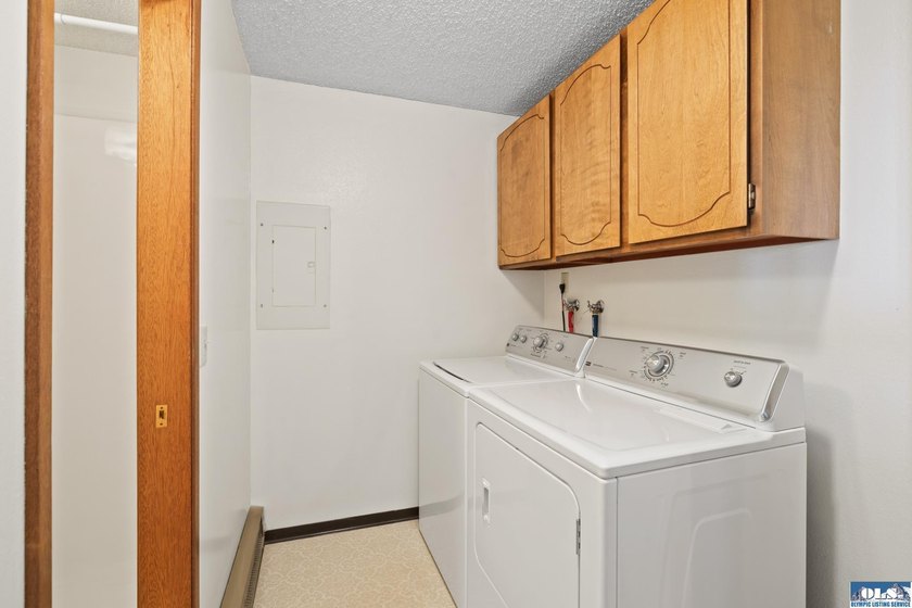 Enjoy easy living in this beautifully situated end-unit condo in - photo 25