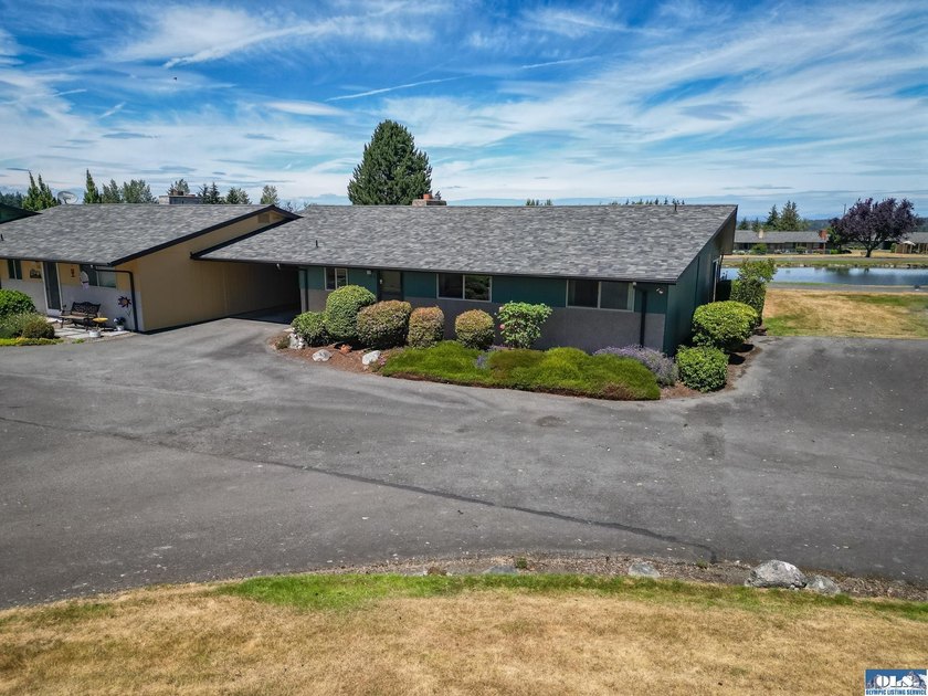 Enjoy easy living in this beautifully situated end-unit condo in - photo 30