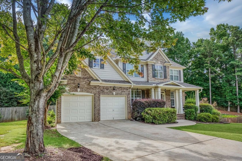 Welcome to this stunning 4-bedroom, 3.5 bath home in Buford's - photo 3