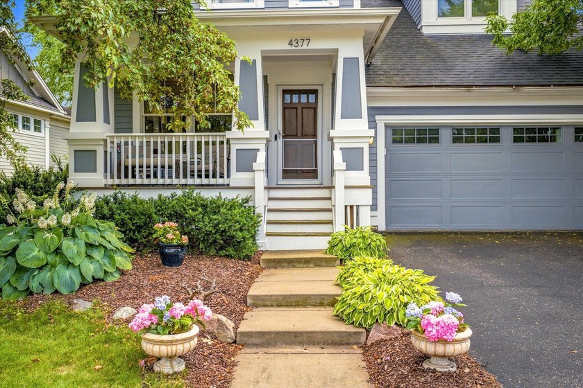 Welcome to this charming 4-bedroom, 4-bathroom home located on a - photo 3