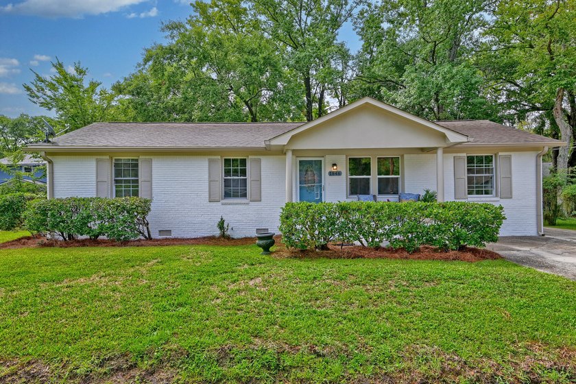 Beautifully renovated brick ranch home tucked away in the heart - photo 14
